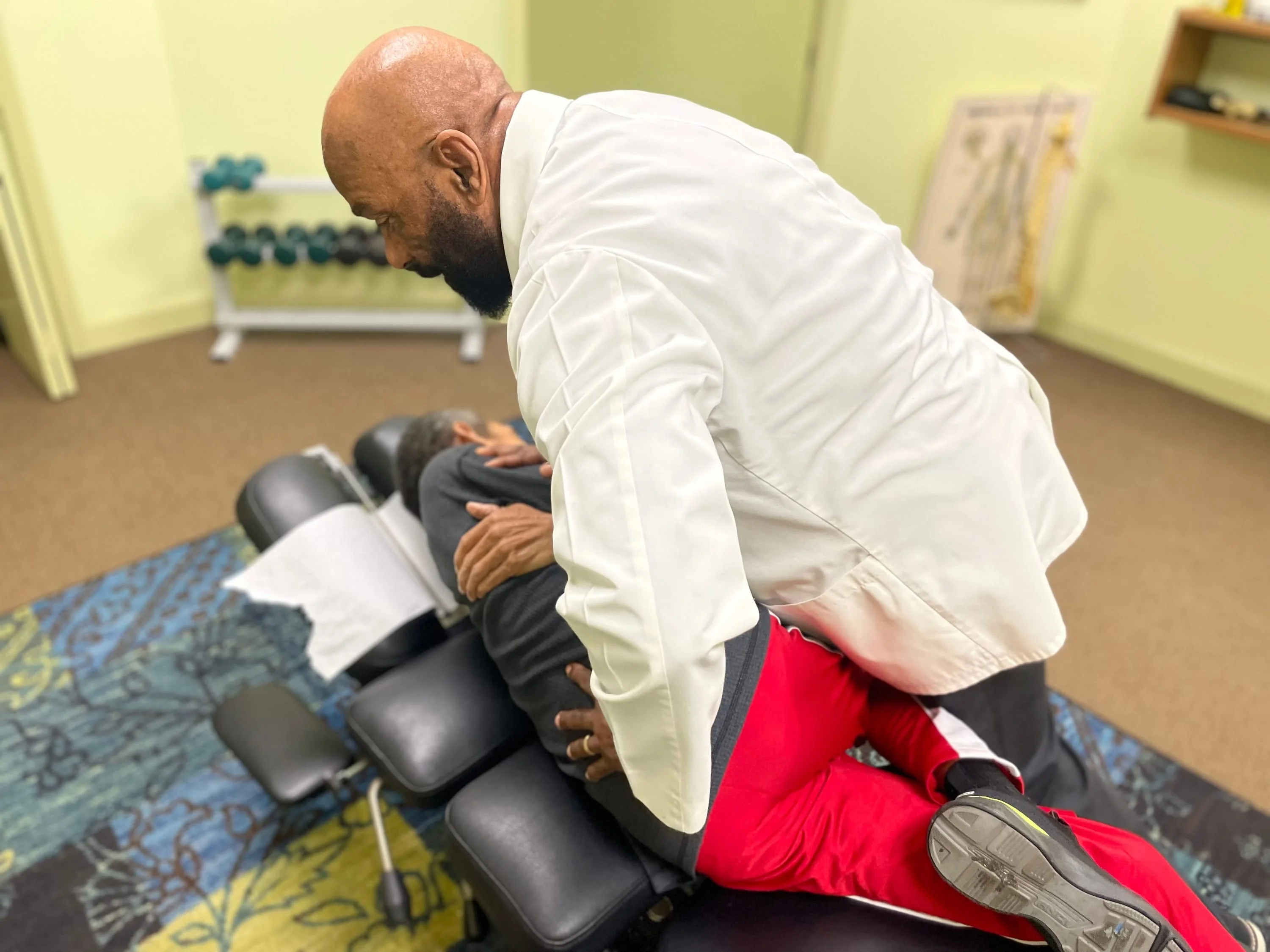 Dr. Wilkerson treating a patient at stoneview injury and wellness clinic