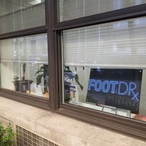 The FOOTDRx sign in the office window