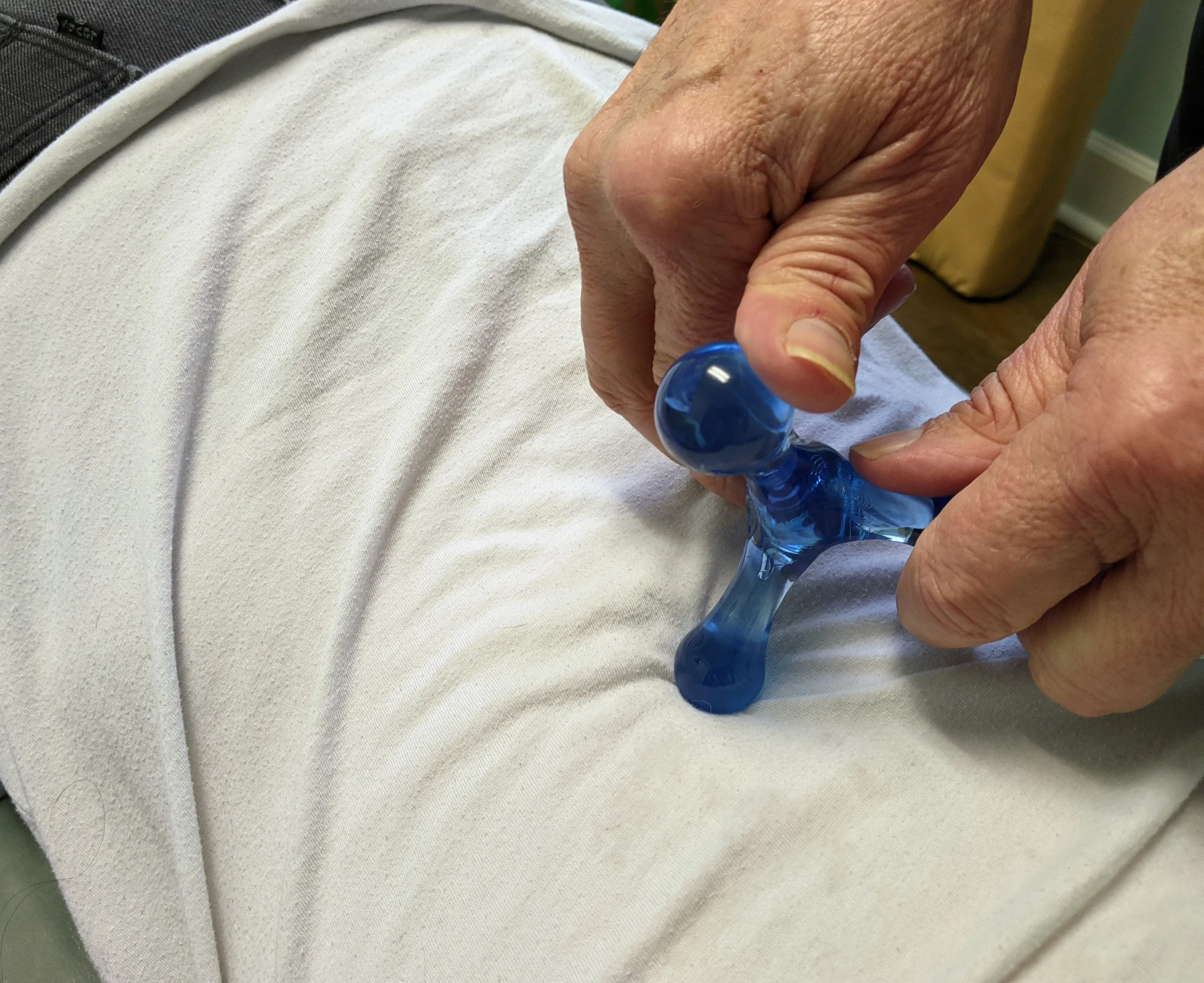 Older male having therapy on neck