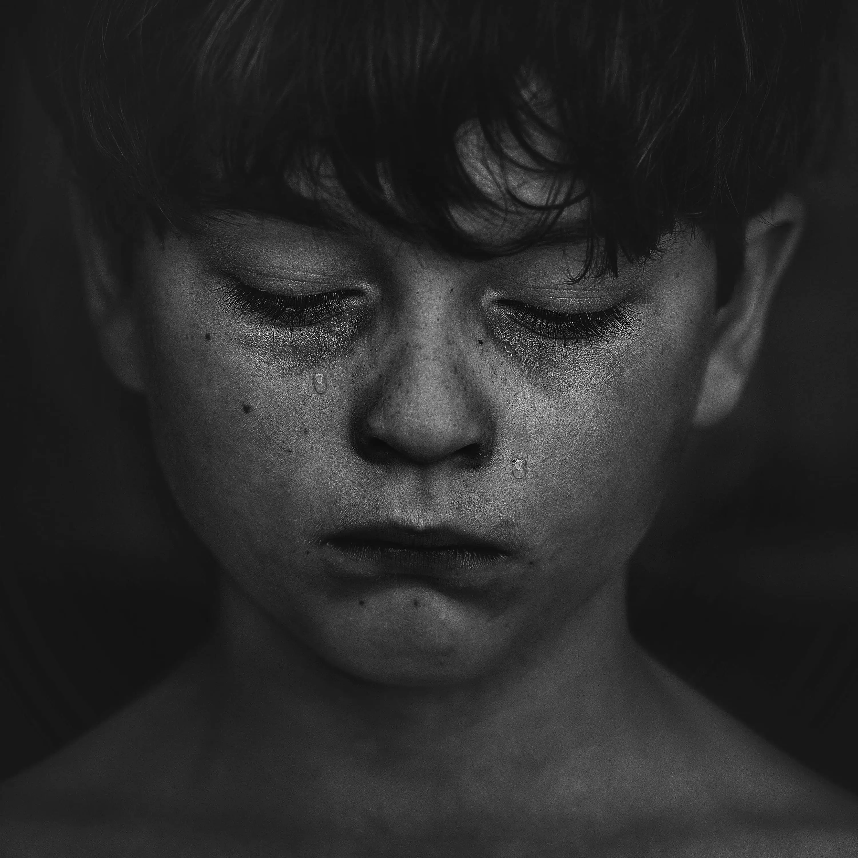 crying boy with depression and sadness