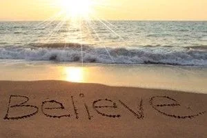 Believe written in the sand