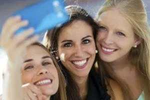 Three young woman enjoying a night out and taking a selfie in Rocky River OH
