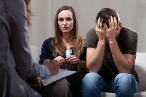 Upset couple in therapy session