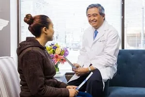 Dr. Mark Gamalinda and a patient