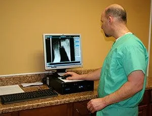 Dr. Keith Rosenthal viewing an xray