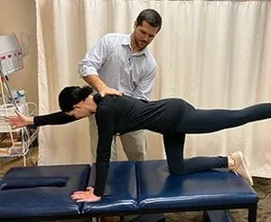 Dr. Matt with an exercise patient