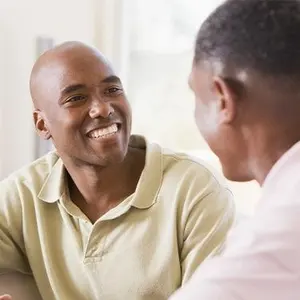 Image of man smiling. 