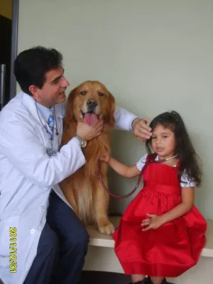Dr. Jimenez and His Daughter with Golden Retriever