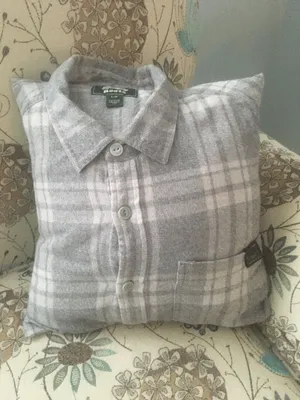 This is a memory pillow made from my Dad's shirt.  I have one made for each of my family members.  It's a special keepsake that we all treasure. 