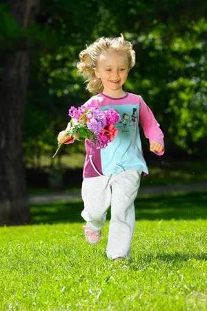 Girl with Flowers - Pediatric Dentist