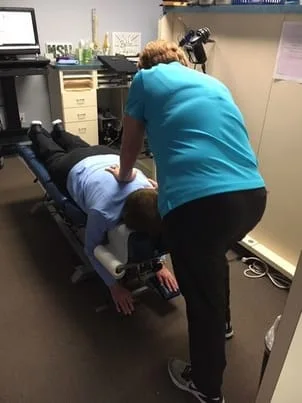 Dr. Kingen adjusting patient