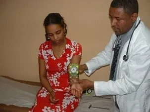 Dr. Ayele working with patient