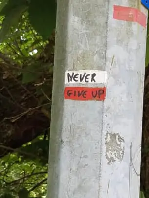 "Never give up" graffiti