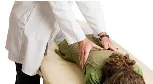Image of woman getting adjusted. 