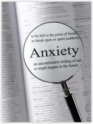 Image of magnifying glass looking at anxiety