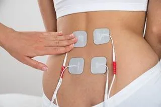 Healing Sore Muscles  Electrical Muscle Stimulation Chiropractic Care