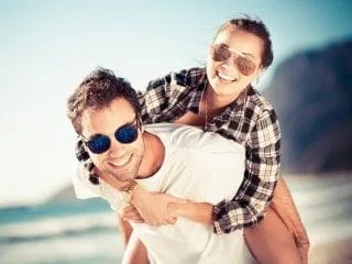 a couple wearing sunglasses