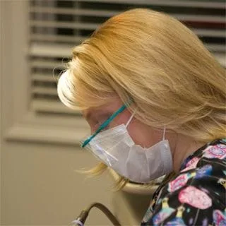 dental hygenist cleaning