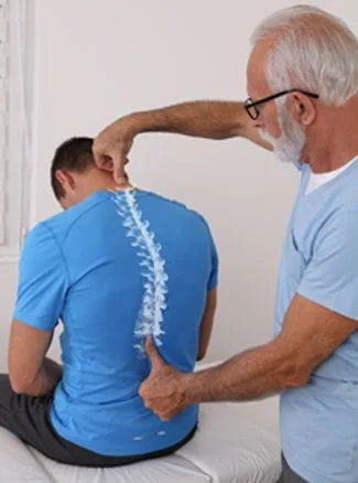 Doctor examining spine