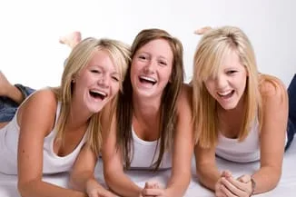 girls laying down and laughing