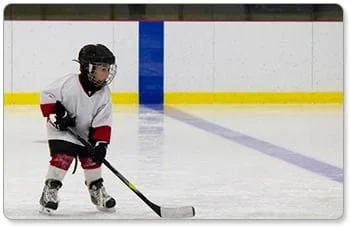 boy playing hockey