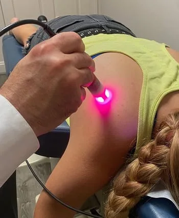 Doctor using laser treatment