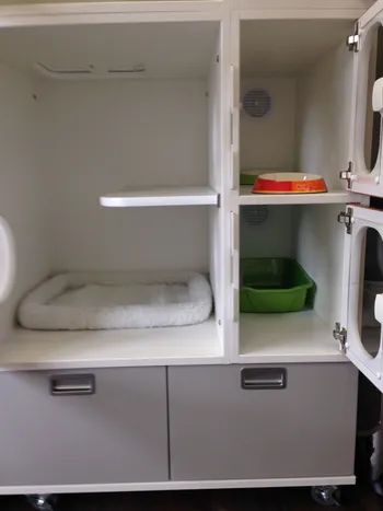 The inside view of each luxury condo; a central sleeping/perch area with portal access to individual litter box and feeding "rooms" for added privacy and cleanliness away from the central rest and play area.  Each "room" has it's own individual vent for odor control and clean air circulation.