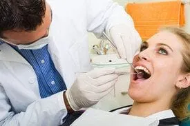 woman having general dentistry checkup with dentist Escanaba, MI