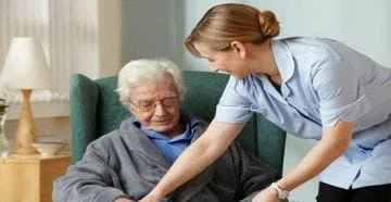 Woman taking care of elderly woman