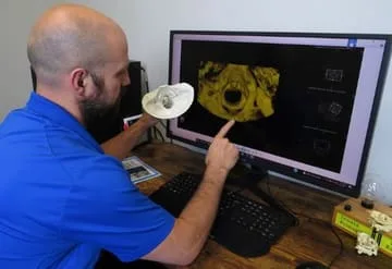 Dr. Ed analyzing 3D images