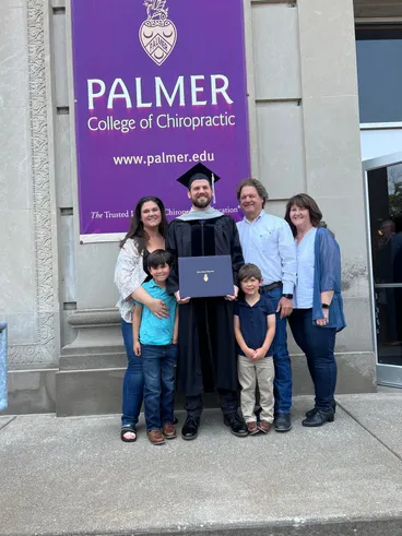 graduation picture with family