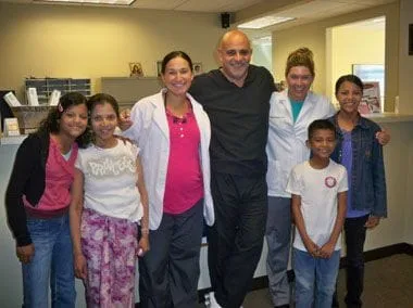 Dr. Di Verde, Dr. Cinqui and Dr. Gallagher with a refugee family from Burma