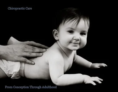 Baby getting an Admustment at Gallagher Chiropractic in Charlotte