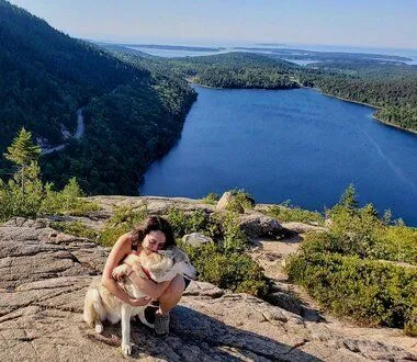 Therapist Rachel Hugging Arrow on a Mountain Top