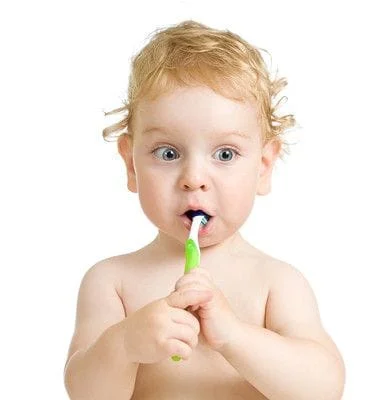 baby with a toothbrush