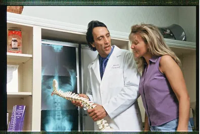 Dr Phillip Dietrich Explaining the X-Ray to patient