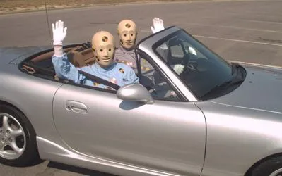 crash_test_couple_waving.jpg