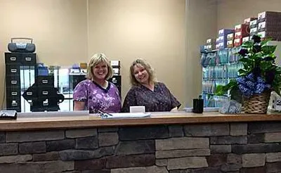 Peg and Julia at the Reception Desk