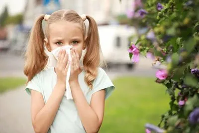 Little girl suffering from seasonal allergies