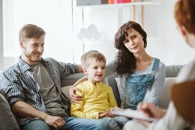 Family attending counseling with their autistic child