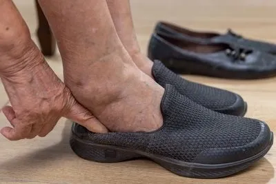 Person wear a diabetic shoes.