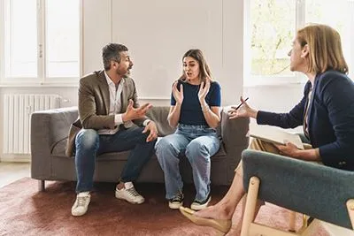 Couple facing relationship challenges in therapy