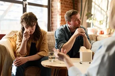 Couple attending divorce counseling to navigate separation and emotional challenges