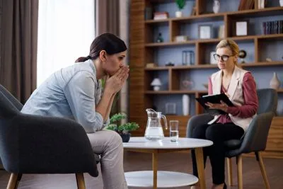 Therapist Helping Woman Manage Stress