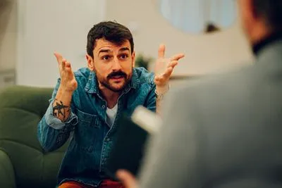 Man with anger issues during therapy