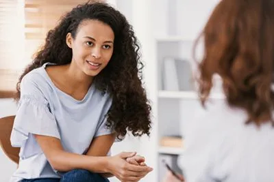 Woman in therapy session for stress management