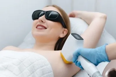 Flawless woman in laser hair removal on clinic.