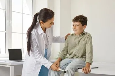 Pediatric physical exam with reflex assessment