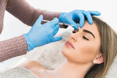 Woman in dermal filling procedure