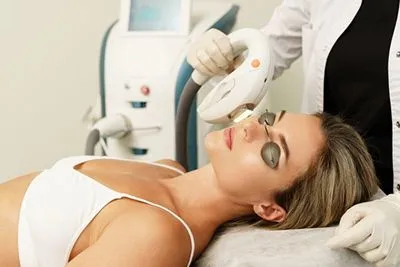 Woman receiving IPL skin treatment